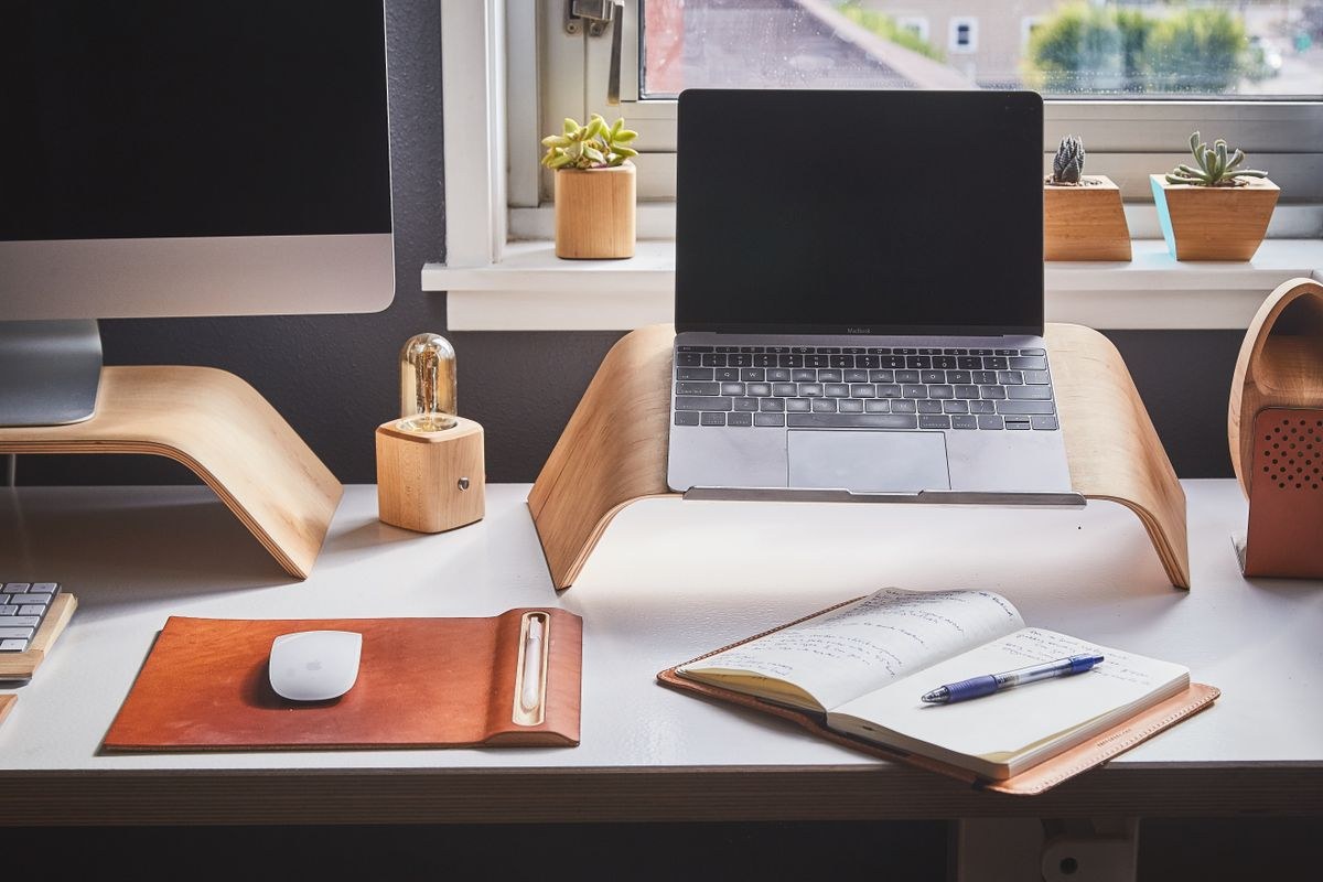 Professional desk setup during a one-to-one portfolio review session